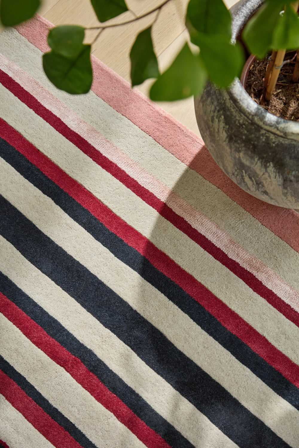 Brink and Campman Calla Pomegranate/Clementine Area Rug by Harlequin Room Image Feature