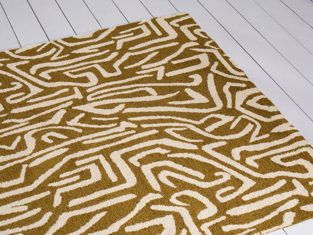Brink and Campman Melodic Ochre/Gold Area Rug by Harlequin Room Image Feature