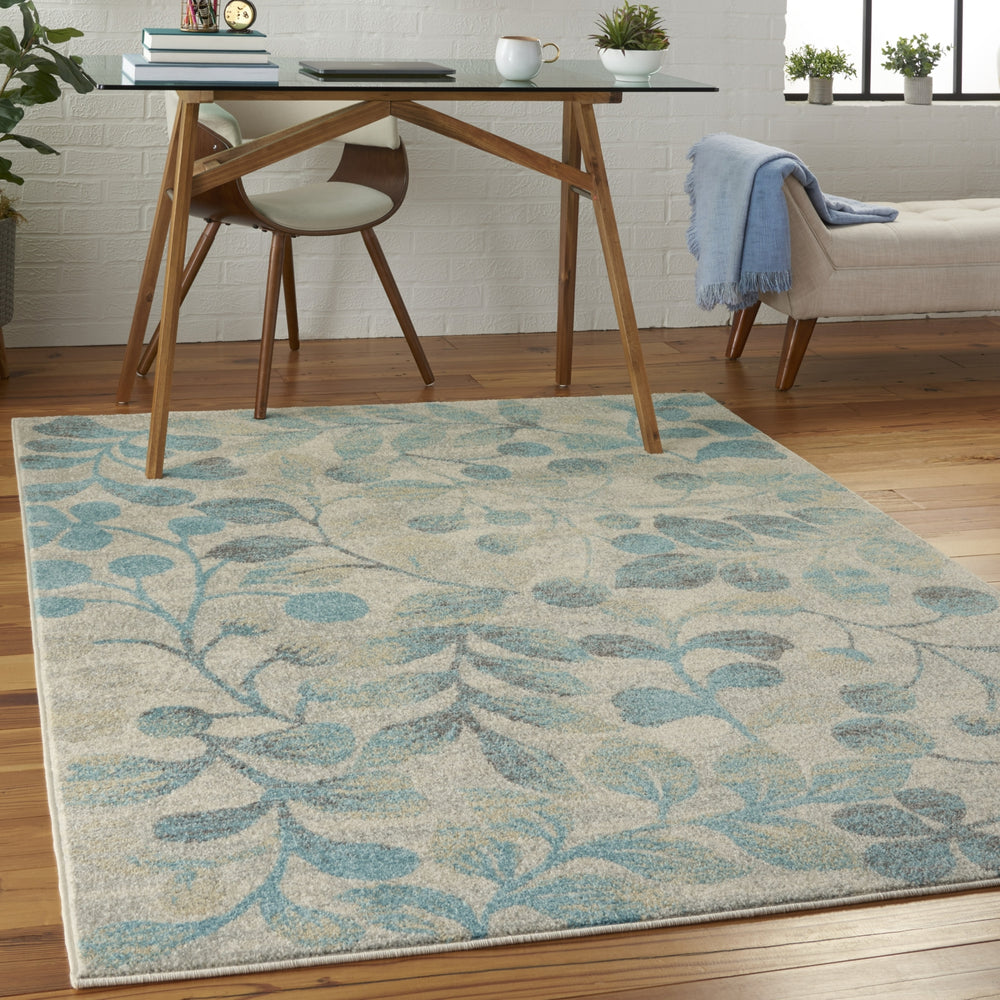 Tranquil TRA03 Ivory/Turquoise Area Rug by Nourison Room Image Feature