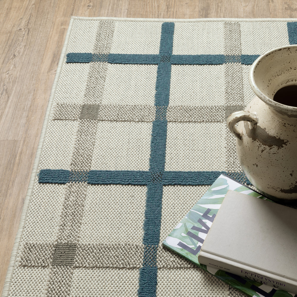 Oriental Weavers Torrey 7150H Beige/ Blue Area Rug Corner On Wood Featured