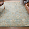 Exquiste Rugs 7228 Featured Patterned blue rug on a wooden floor with furniture around