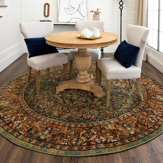 Karastan Spice Market Tigris Aquamarine rug in a dining room Featured setting under a table.