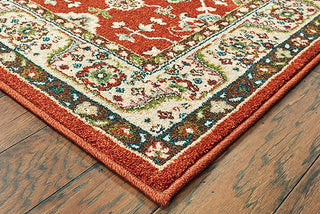 Oriental Weavers Dawson 8315A Rust/Blue Area Rug Corner On Wood