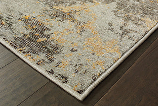 Oriental Weavers Evolution 8025B Grey/ Gold Area Rug Corner On Wood