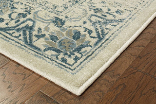 Oriental Weavers Linden 7909A Ivory/ Blue Area Rug Corner On Wood