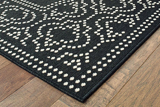 Oriental Weavers Marina 1247K Black/Ivory Area Rug Corner On Wood