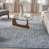 Nourison Alessia ALE01 Blue Area Rug by Reserve Collection Featured image with coffee table in 6x9 size