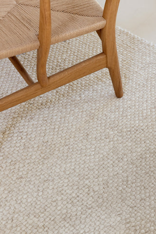 Brink and Campman Craft Matter Plain Warm White Area Rug Room Image Feature