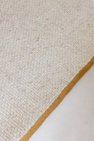 Brink and Campman Craft Matter Plain Warm White Area Rug Room Image Feature
