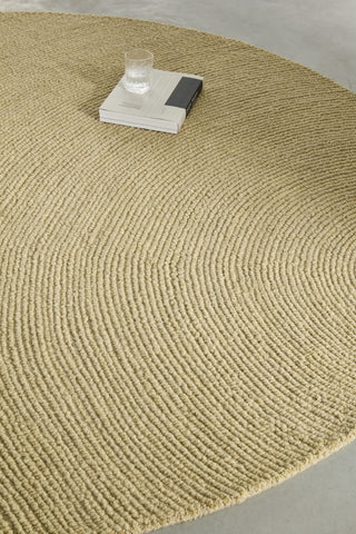 Brink and Campman Decor Echo Sand Area Rug Round Room Image Feature