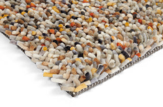 Brink and Campman Dots Calendula Area Rug Corner Image