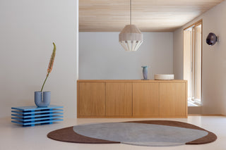 Brink and Campman Element Chad Brown Blue Area Rug Room Image Feature
