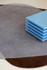 Brink and Campman Element Chad Brown Blue Area Rug Room Image Feature
