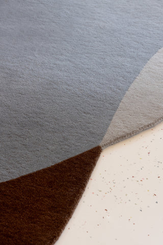 Brink and Campman Element Chad Brown Blue Area Rug Room Image Feature