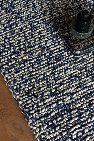 Brink and Campman Nest Ink Area Rug Room Image Feature
