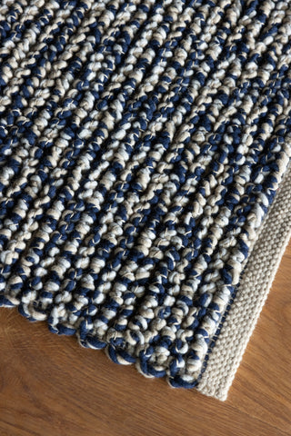 Brink and Campman Nest Ink Area Rug Room Image Feature