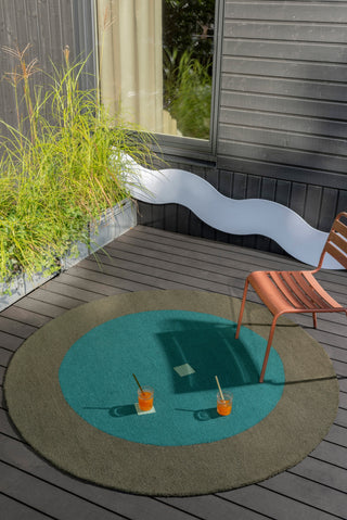 Brink and Campman Habitat Festival Round Aqua Area Rug Round Room Image Feature