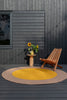 Brink and Campman Habitat Festival Round Yellow Area Rug Round Room Image Feature