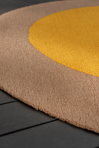 Brink and Campman Habitat Festival Round Yellow Area Rug Round Room Image Feature