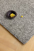 Brink and Campman Origin Loop Stone Area Rug Room Image Feature