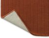 Brink and Campman Decor Rhythm Tangerine Area Rug Fold Image