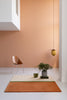 Brink and Campman Decor Rhythm Tangerine Area Rug Room Image Feature