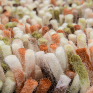 Brink and Campman Rocks Pumpkin Area Rug Closeup Image