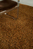 Brink and Campman Sprout Burnt Tangerine Area Rug Room Image Feature