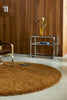 Brink and Campman Sprout Burnt Tangerine Area Rug Round Room Image Feature