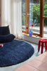 Brink and Campman Sprout Cobalt Eclipse Area Rug Round Room Image Feature