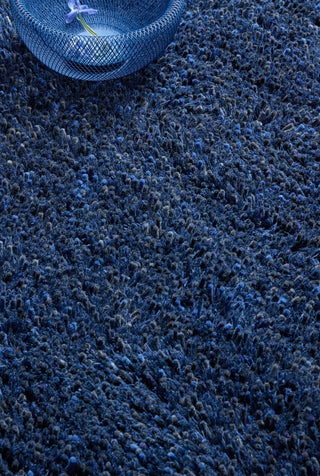 Brink and Campman Sprout Cobalt Eclipse Area Rug Round Room Image Feature