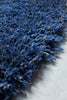 Brink and Campman Sprout Cobalt Eclipse Area Rug Round Room Image Feature