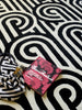Brink and Campman Turnabouts Black Area Rug by Florence Broadhurst Room Image Feature