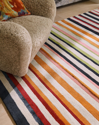 Brink and Campman Calla Pomegranate/Clementine Area Rug by Harlequin Room Image Feature