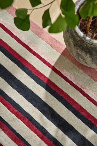 Brink and Campman Calla Pomegranate/Clementine Area Rug by Harlequin Room Image Feature