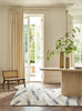 Brink and Campman Diffinity Oyster Area Rug by Harlequin Room Image Feature