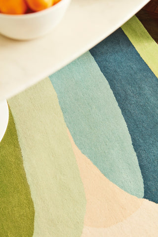 Brink and Campman Elliptic Emerald Area Rug by Harlequin Room Image Feature