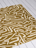 Brink and Campman Melodic Ochre/Gold Area Rug by Harlequin Room Image Feature