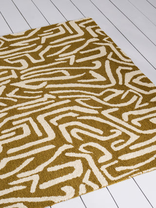 Brink and Campman Melodic Ochre/Gold Area Rug by Harlequin Room Image Feature