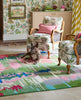 Brink and Campman Wilderness Peridot/Emerald Area Rug by Harlequin x Sophie Robinson Room Image Feature
