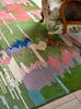 Brink and Campman Wilderness Peridot/Emerald Area Rug by Harlequin x Sophie Robinson Room Image Feature