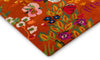 Brink and Campman Wonderland Floral Amber/Lapis Area Rug by Harlequin x Sophie Robinson Corner Image
