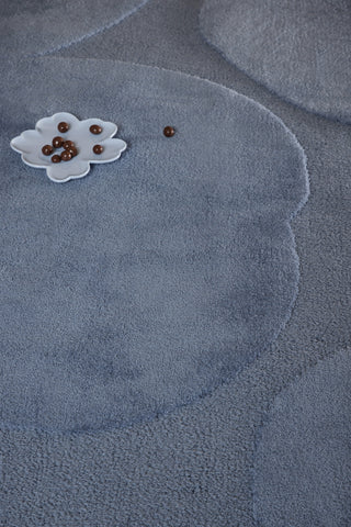 Brink and Campman Iso Unikko Dusty Blue Area Rug by Marimekko Room Image Feature