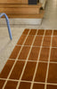 Brink and Campman Tiiliskivi Brown Area Rug by Marimekko Runner Room Image Feature
