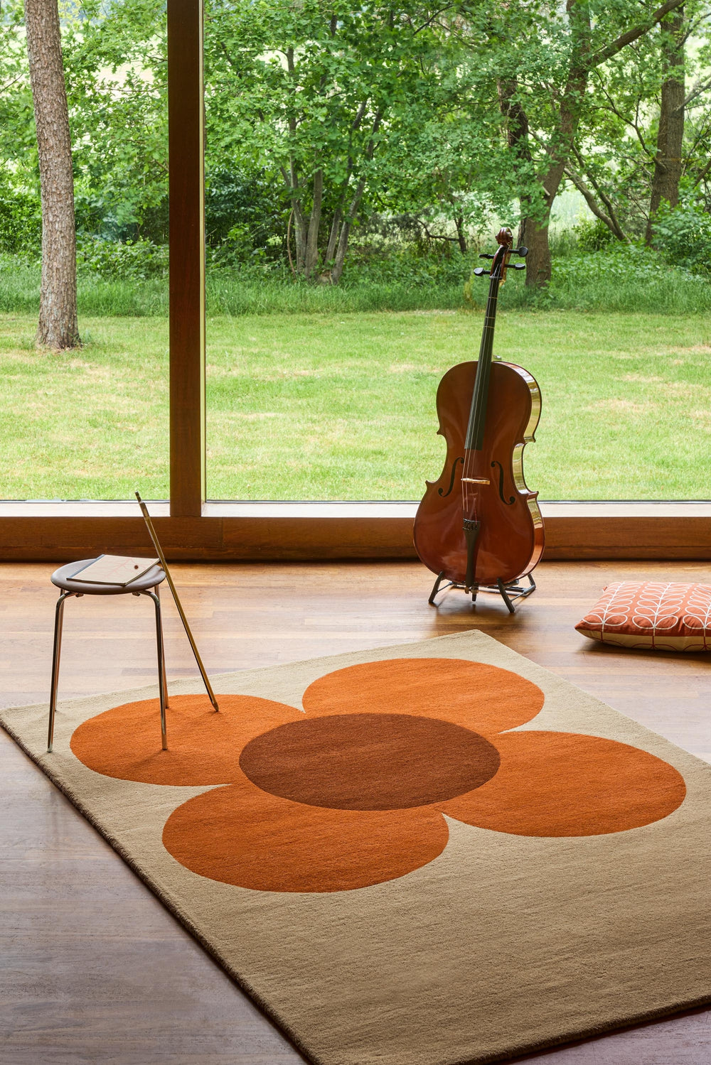 Brink and Campman Flower Placement Pumpkin/Ecru Area Rug by Orla Kiely Room Image Feature