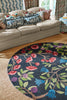 Brink and Campman Foraging Indigo Area Rug by Sanderson Round Room Image Feature