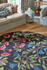Brink and Campman Foraging Indigo Area Rug by Sanderson Round Room Image Feature