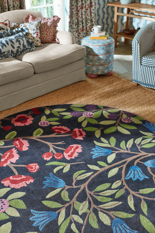 Brink and Campman Foraging Indigo Area Rug by Sanderson Round Room Image Feature