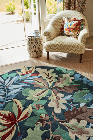 Brink and Campman Robin's Wood Forest Green Area Rug by Sanderson Round Room Image Feature