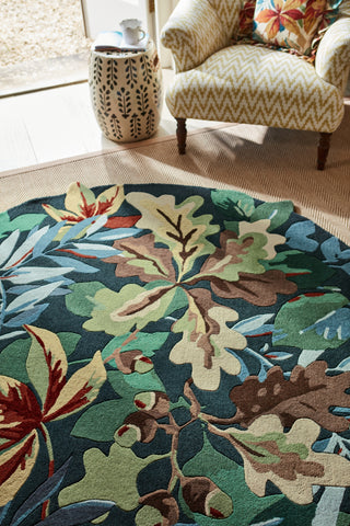 Brink and Campman Robin's Wood Forest Green Area Rug by Sanderson Round Room Image Feature